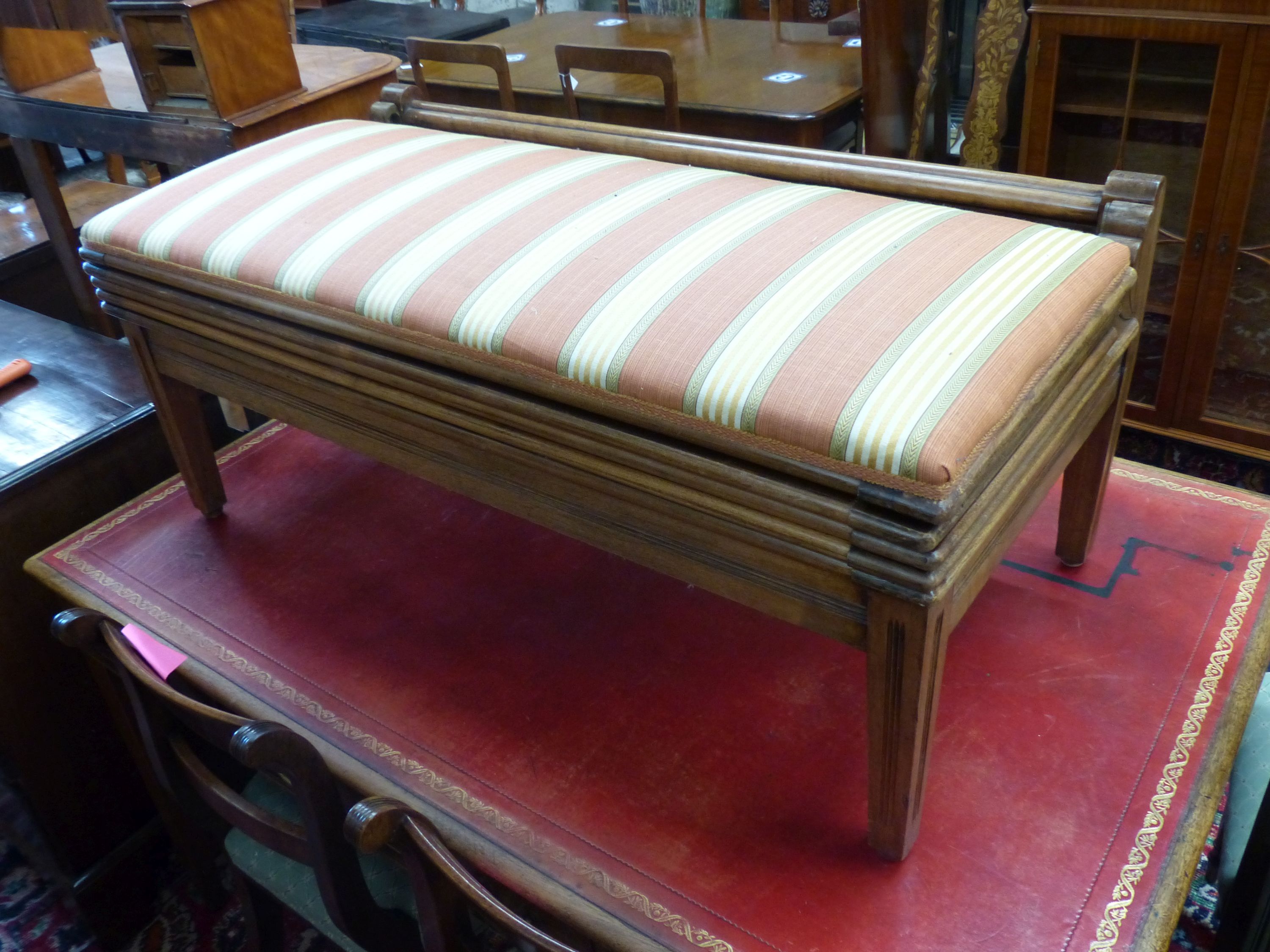 A mahogany trouser press-cum-bench seat, circa 1900, height 45cm, width 106cm, depth 54cm